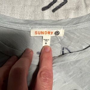 Sundry Light Gray/Blue “Hola/Adios”Casual Tee with Ruffled Sleeves.